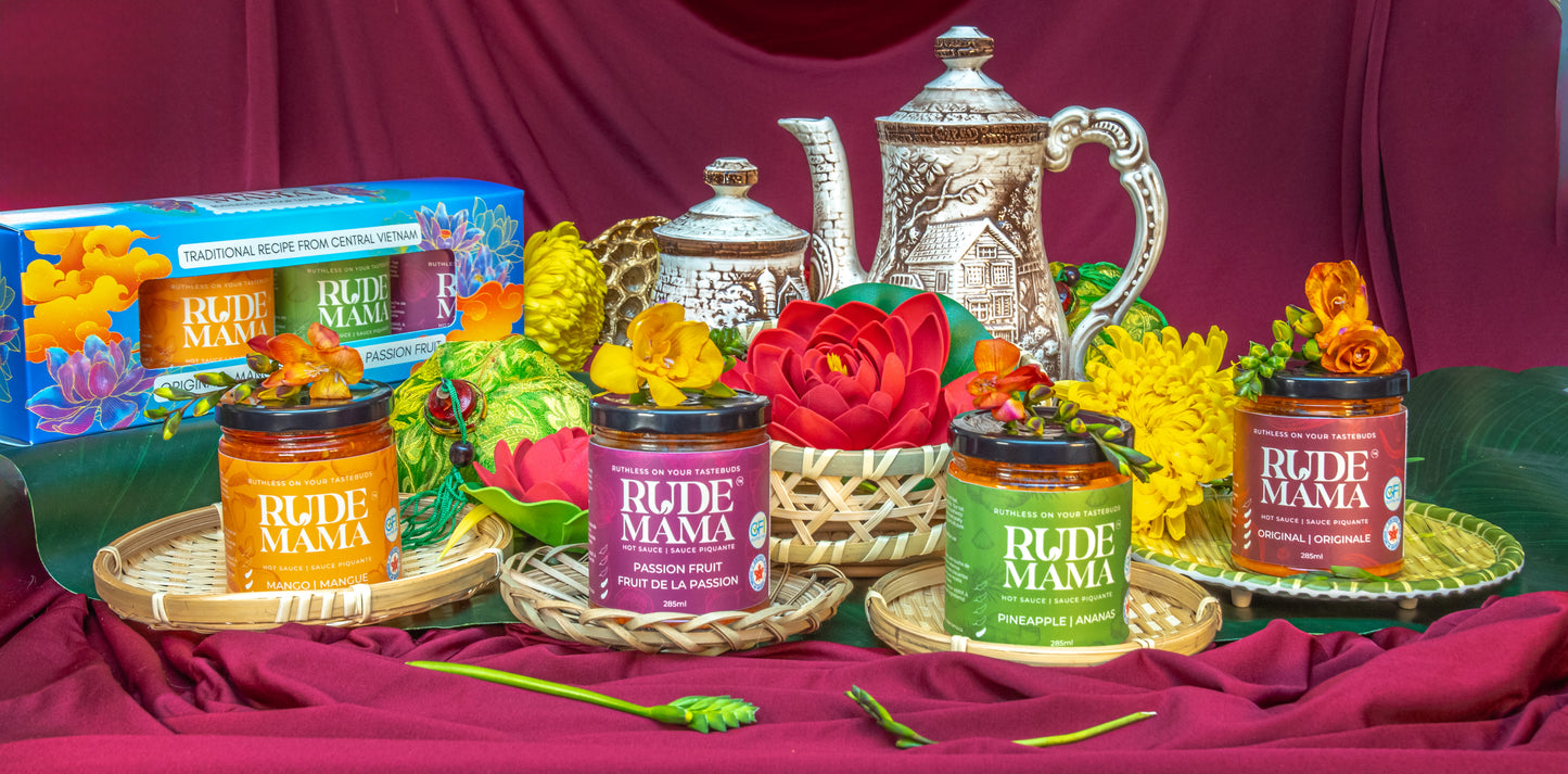 Rude Mama products with decorative elements on a red fabric background